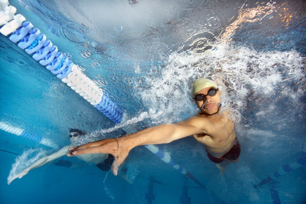 swimmers-racing-in-pool
